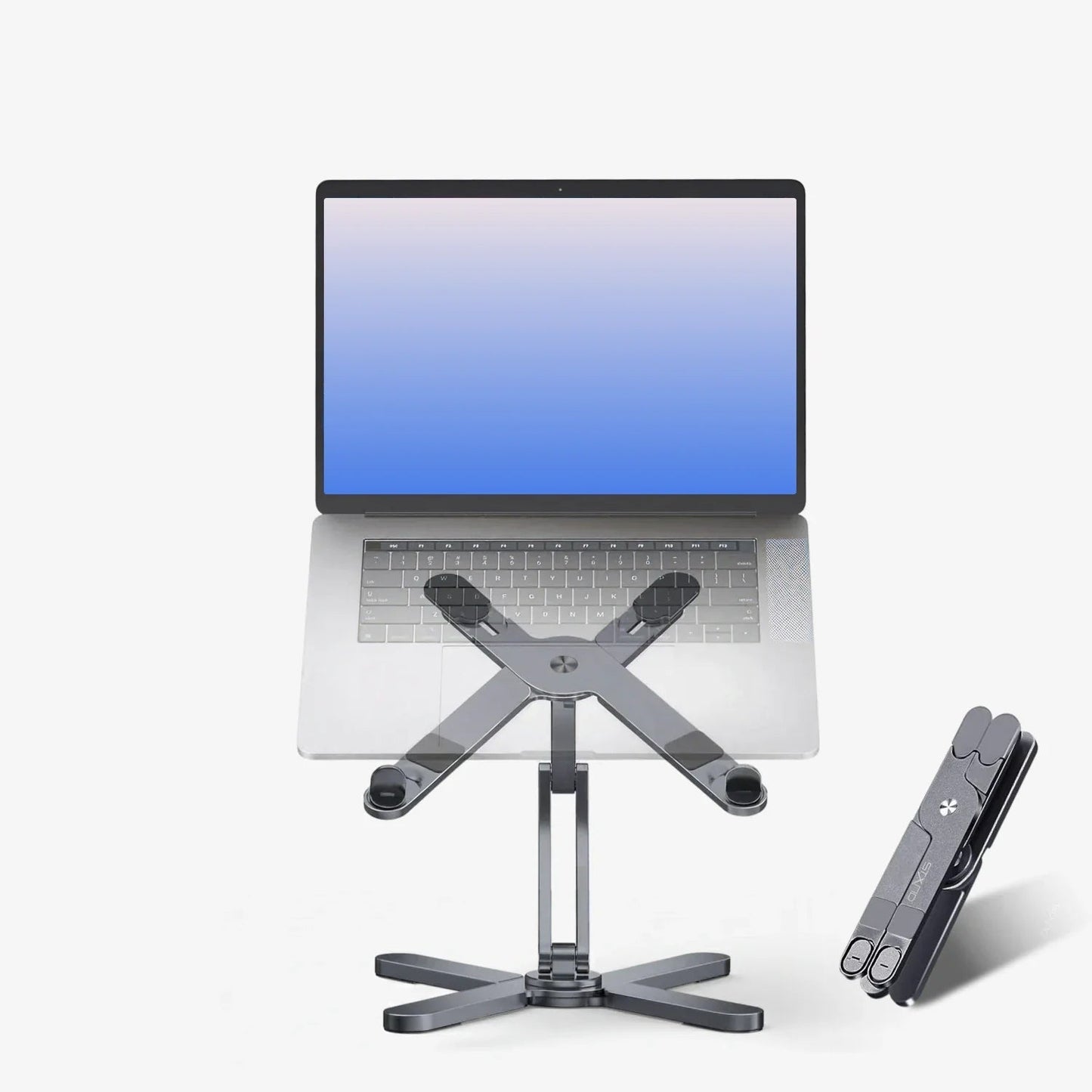 background: #8f8f8f; background: linear-gradient(90deg, rgba(143, 143, 143, 1) 0%, rgba(31, 31, 31, 1) 71%); Person using a laptop on a stand in an office setting with a red wall.